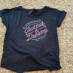 Womens cute cut Cocktails and Dreams T shirt worn to a concert.